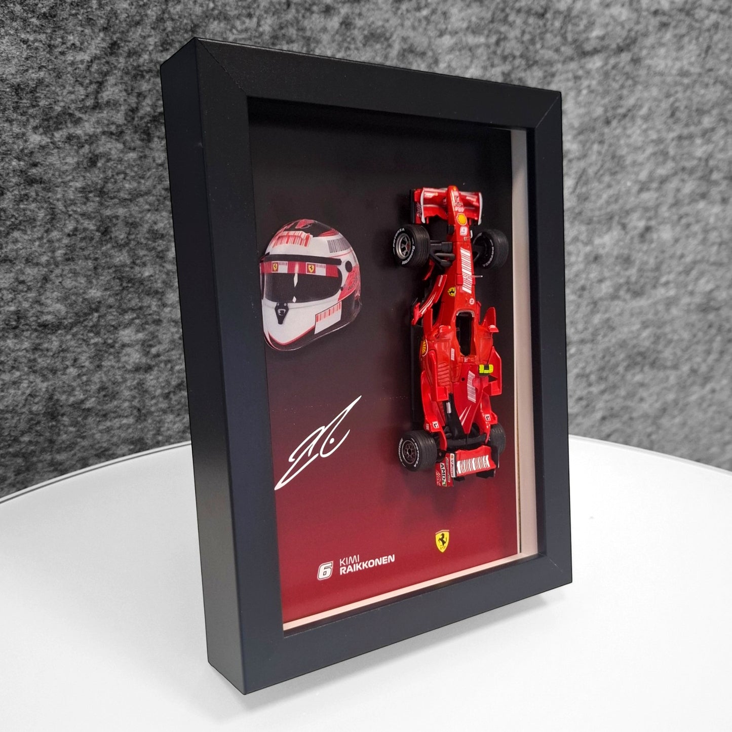 Kimi Raikkonen F1 Frame with Ferrari 1:43 Scale Car, 3D Helmet and Signature