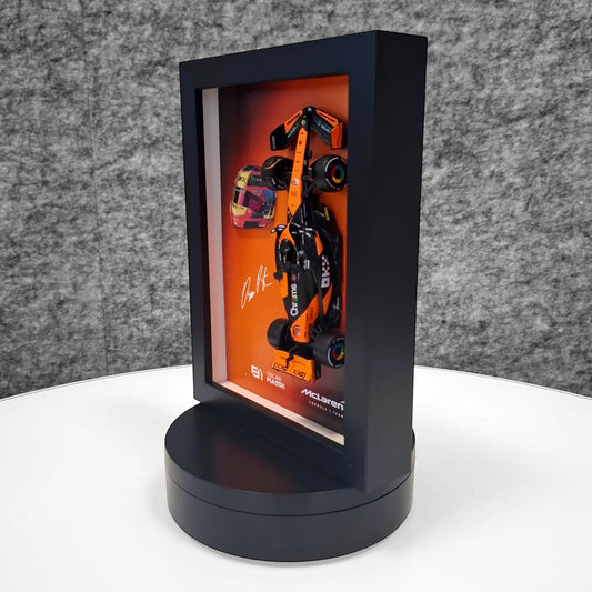 Oscar Piastri #81 - F1 Frame with McLaren 1:43 Scale Car, 3D Helmet and Signature