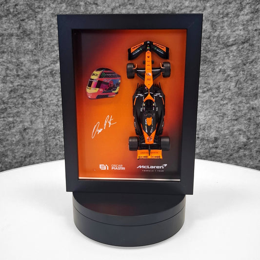 Oscar Piastri #81 - F1 Frame with McLaren 1:43 Scale Car, 3D Helmet and Signature