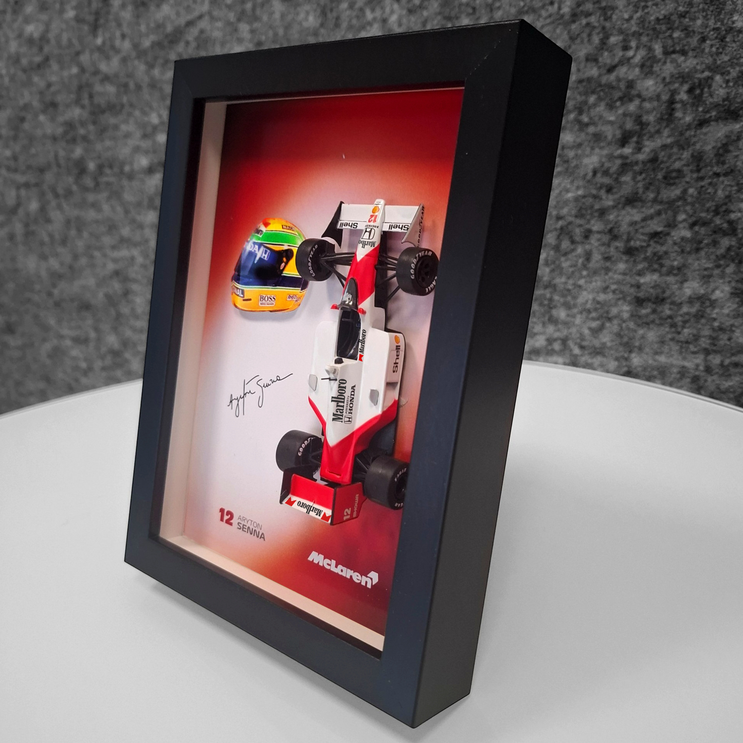 Aryton Senna #12 - F1 Frame with McLaren 1:43 Scale Car, 3D Helmet and Signature
