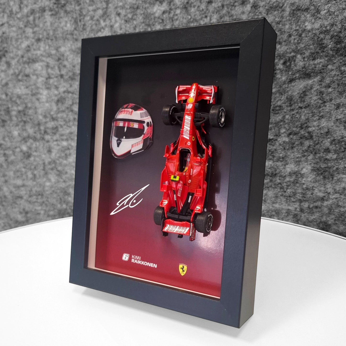 Kimi Raikkonen F1 Frame with Ferrari 1:43 Scale Car, 3D Helmet and Signature