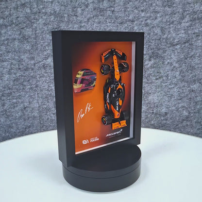 Oscar Piastri #81 - F1 Frame with McLaren 1:43 Scale Car, 3D Helmet and Signature