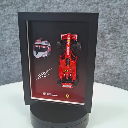 Kimi Raikkonen F1 Frame with Ferrari 1:43 Scale Car, 3D Helmet and Signature